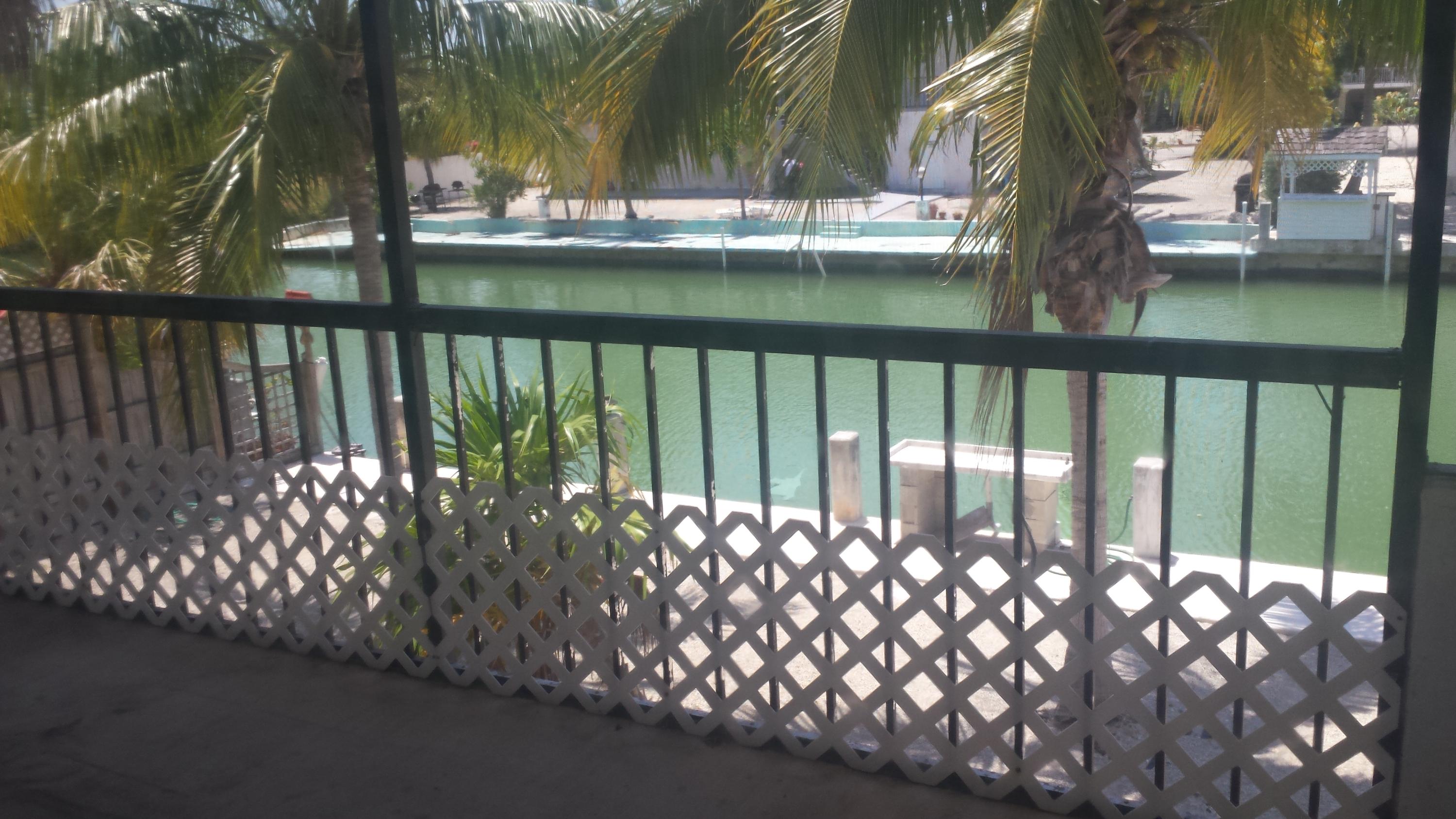 302 Sombrero Beach Road, Unit 4 Marathon, FL 33050 - Photo 9 of 12 Screened porch