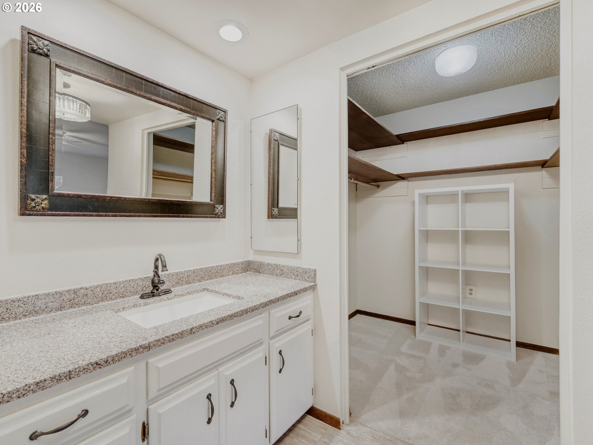 16588 Southwest Matador Lane Portland, OR 97224 - Photo 20 of 28 a bathroom with a sink double vanity and a mirror