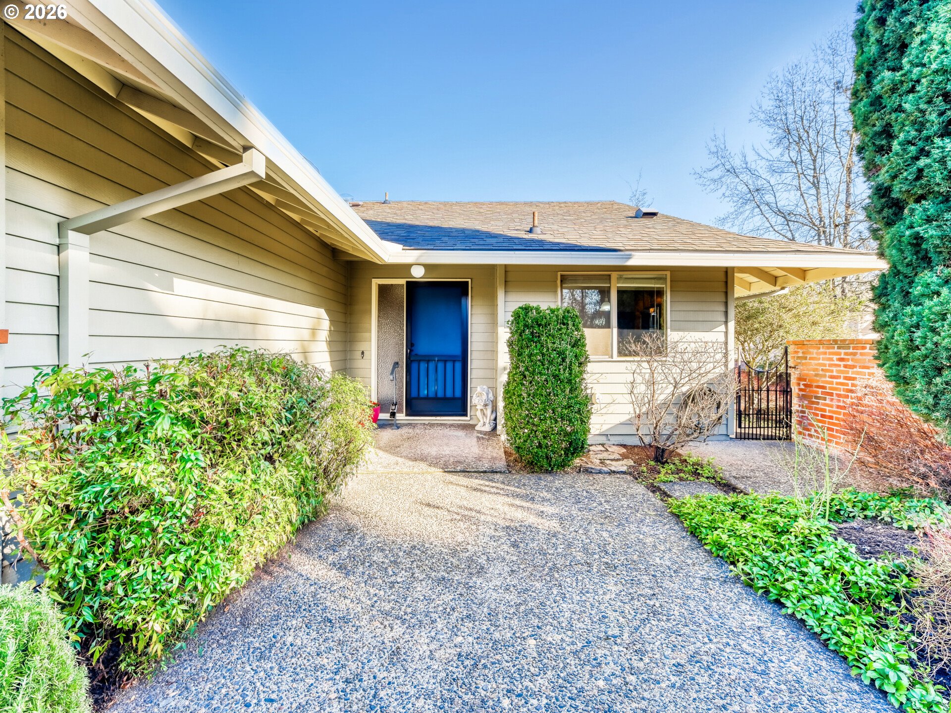 16588 Southwest Matador Lane Portland, OR 97224 - Photo 3 of 28 a front view of a house with garden