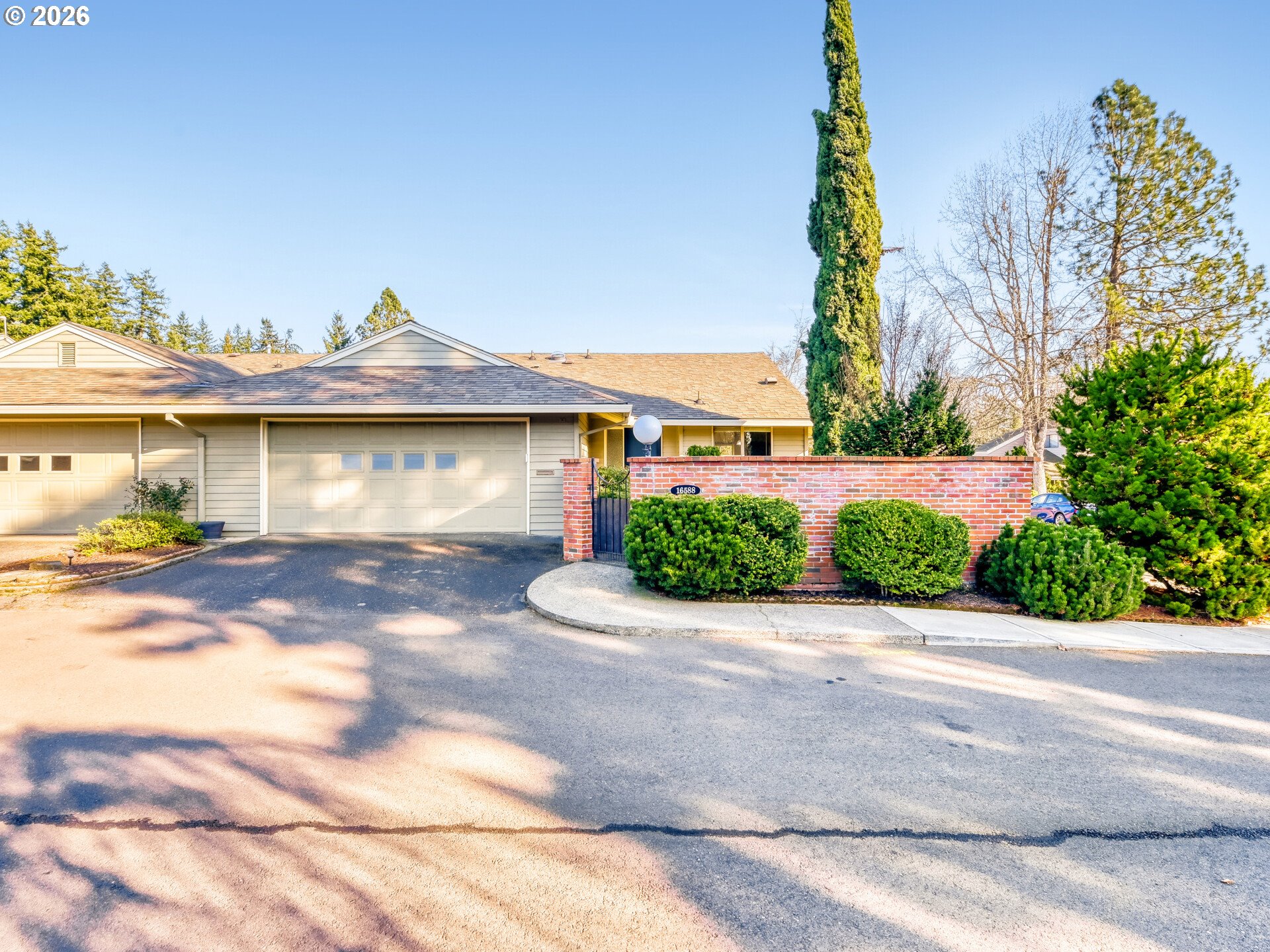 16588 Southwest Matador Lane Portland, OR 97224 - Photo 5 of 28 a front view of a house with garden