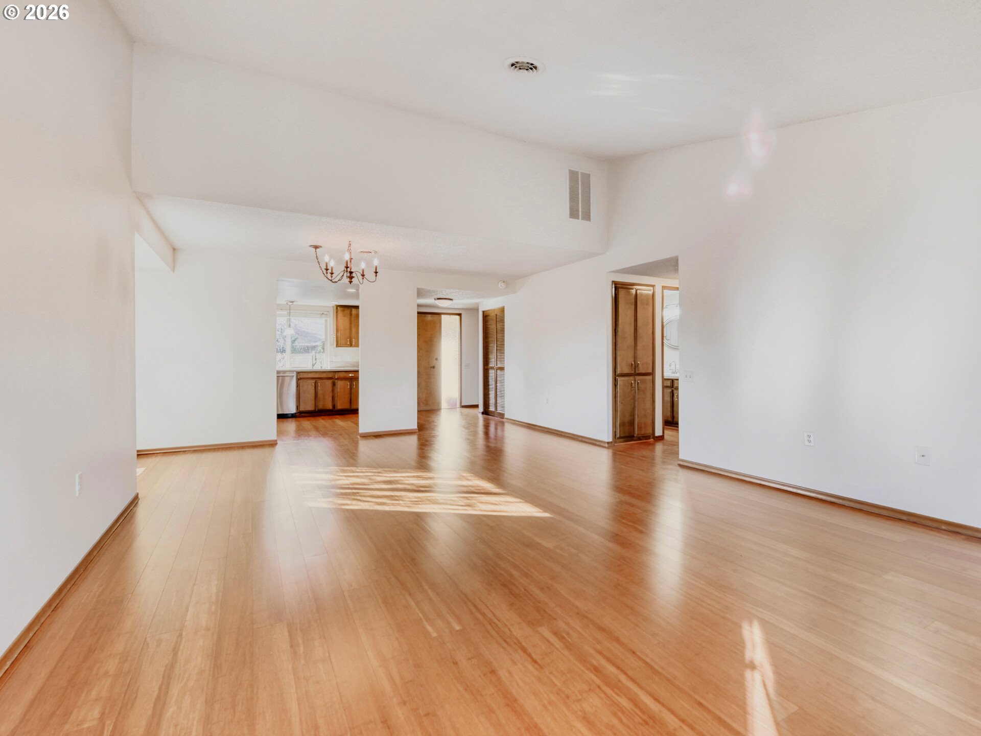 16588 Southwest Matador Lane Portland, OR 97224 - Photo 10 of 28 a view of empty room with wooden floor