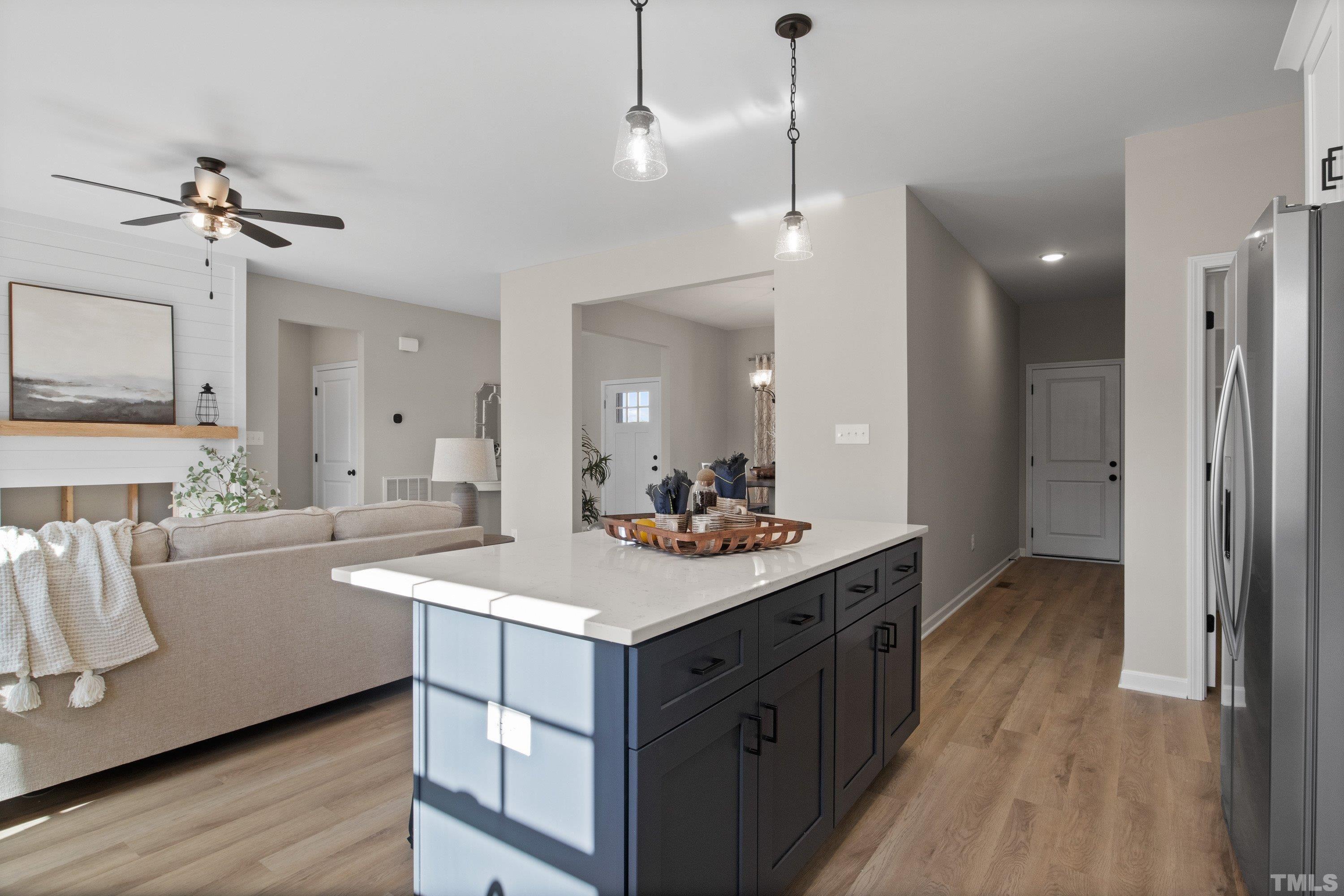 9765 Bear Run Lane Middlesex, NC 27557 - Photo 21 of 38 a kitchen with a sink and stove