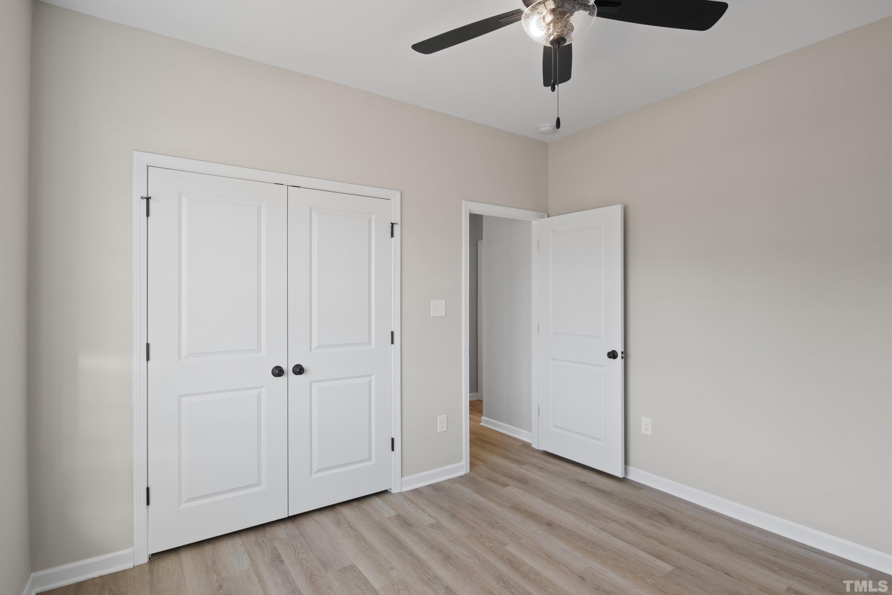9765 Bear Run Lane Middlesex, NC 27557 - Photo 35 of 38 a view of an empty room and chandelier fan