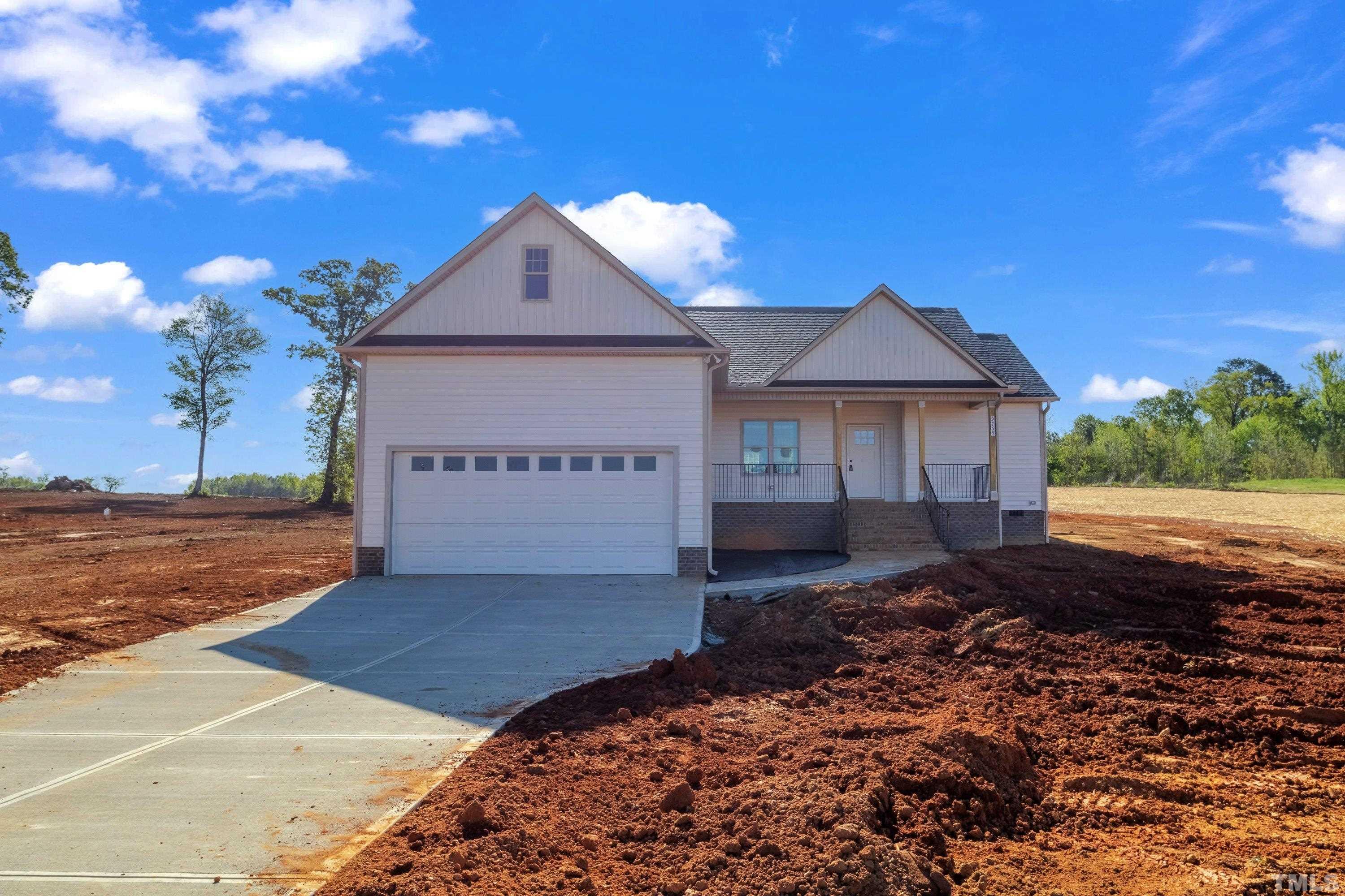 9765 Bear Run Lane Middlesex, NC 27557 - Photo 37 of 38 a front view of a house with a yard