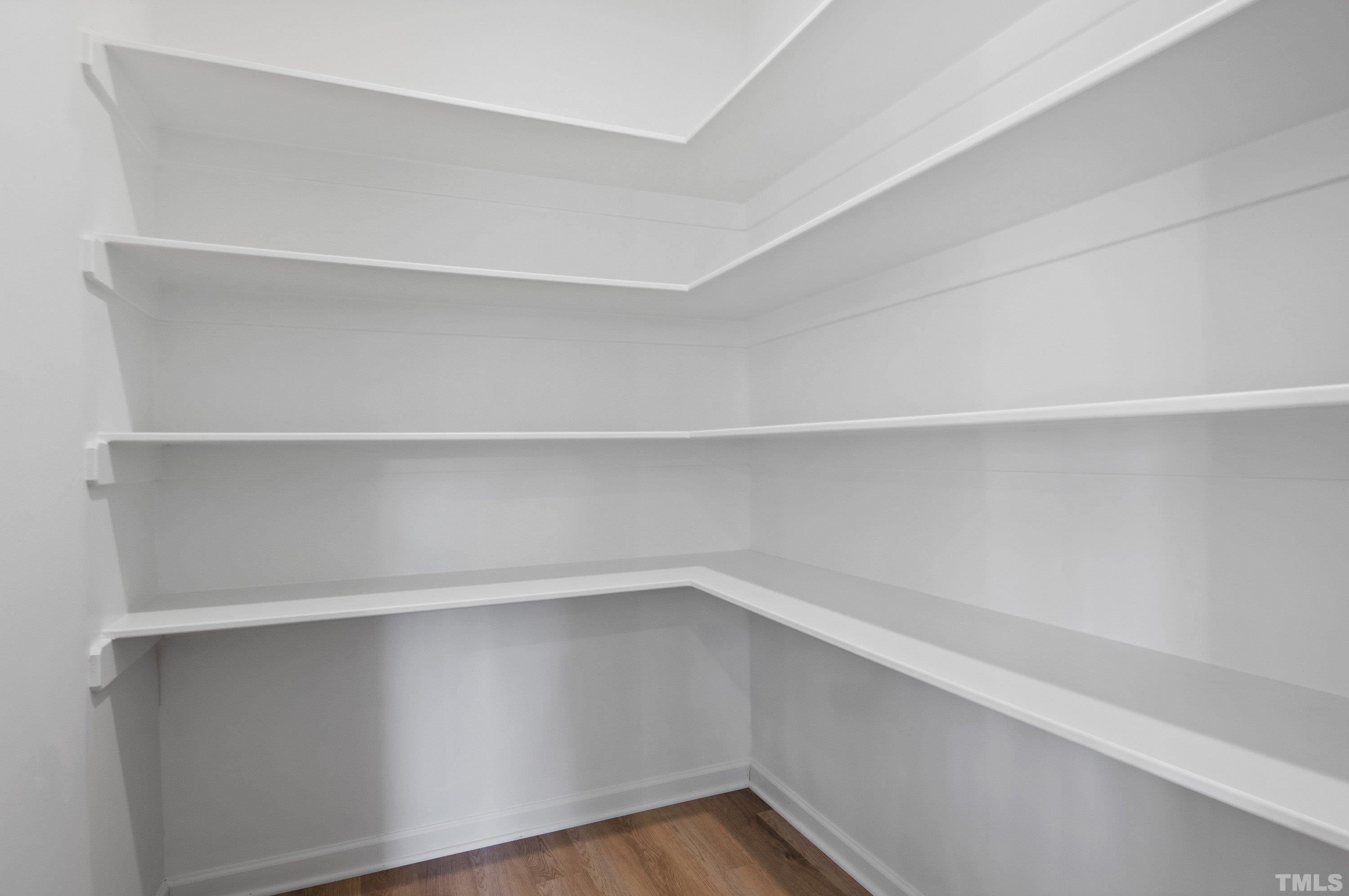 9765 Bear Run Lane Middlesex, NC 27557 - Photo 5 of 38 a view of an empty walk in closet