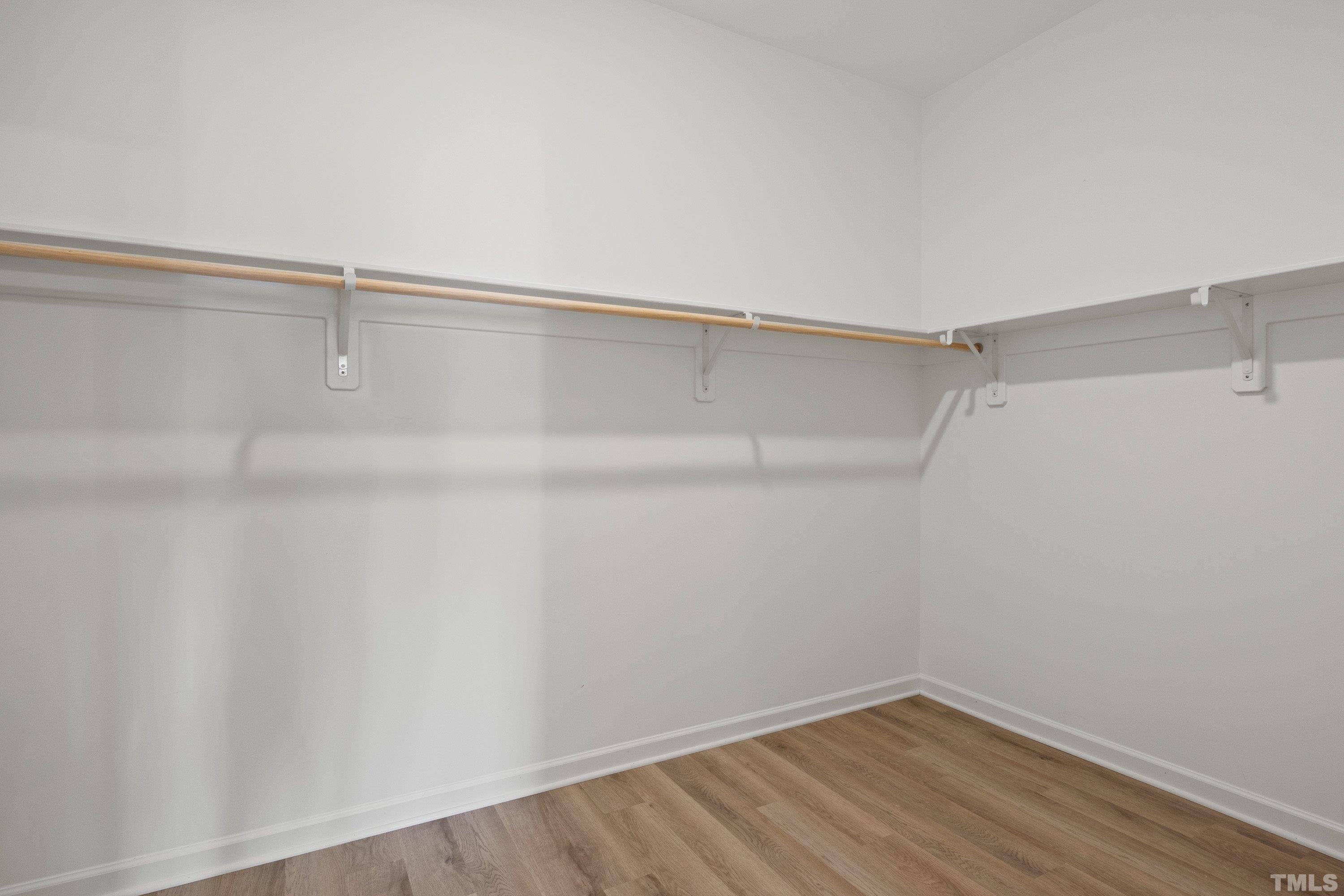 9765 Bear Run Lane Middlesex, NC 27557 - Photo 8 of 38 a view of an empty walk in closet