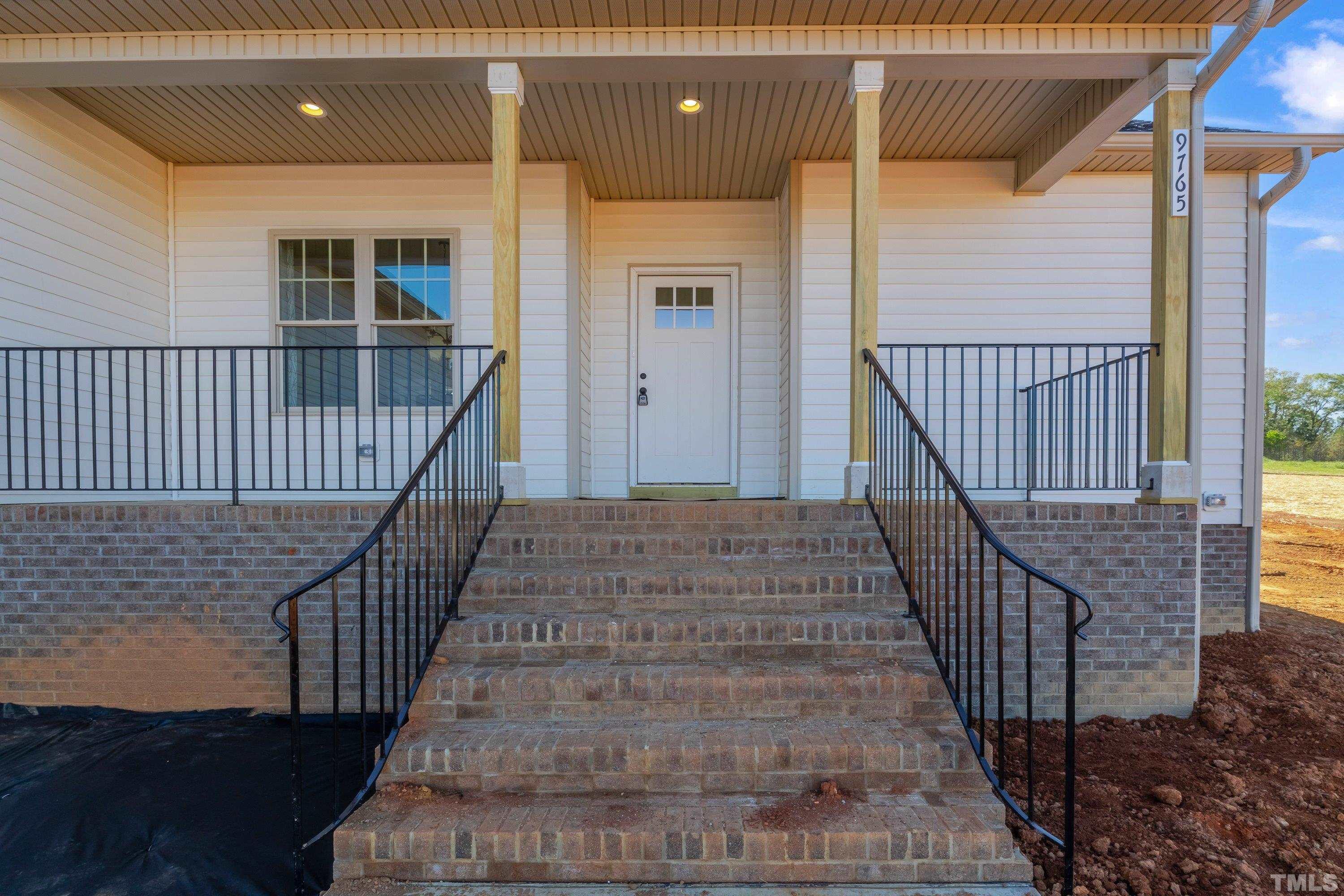 9765 Bear Run Lane Middlesex, NC 27557 - Photo 10 of 38 a view of entryway with wooden floor