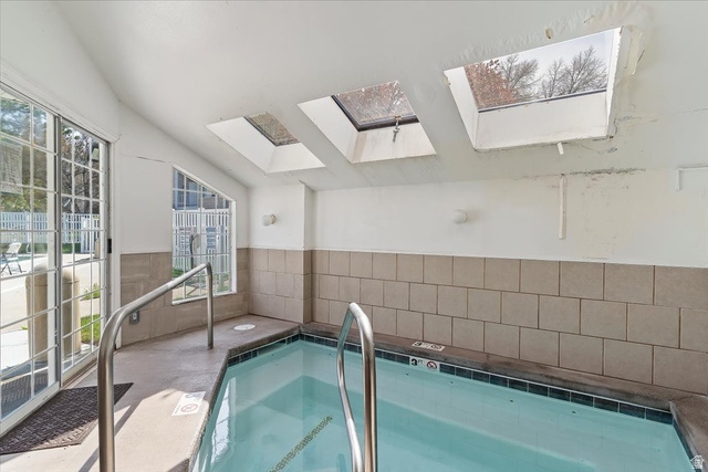 650 South Main Street, Unit 4104 Bountiful, UT 84010 - Photo 20 of 22 View of pool with a skylight and a hot tub