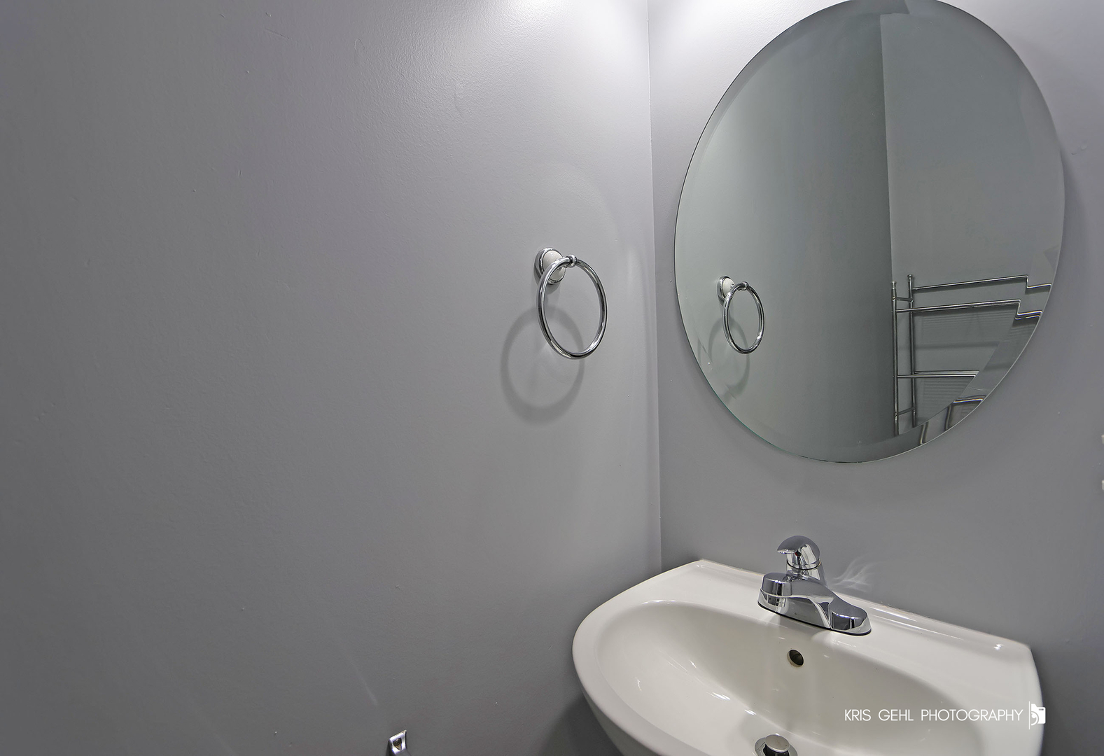 3141 Falling Waters Lane, Unit 3141 Lindenhurst, IL 60046 - Photo 14 of 17 a bathroom with a sink and mirror