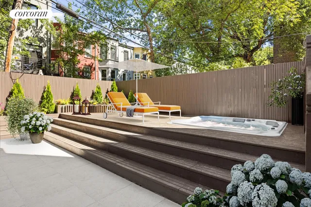 a bedroom with a large bed and a large window