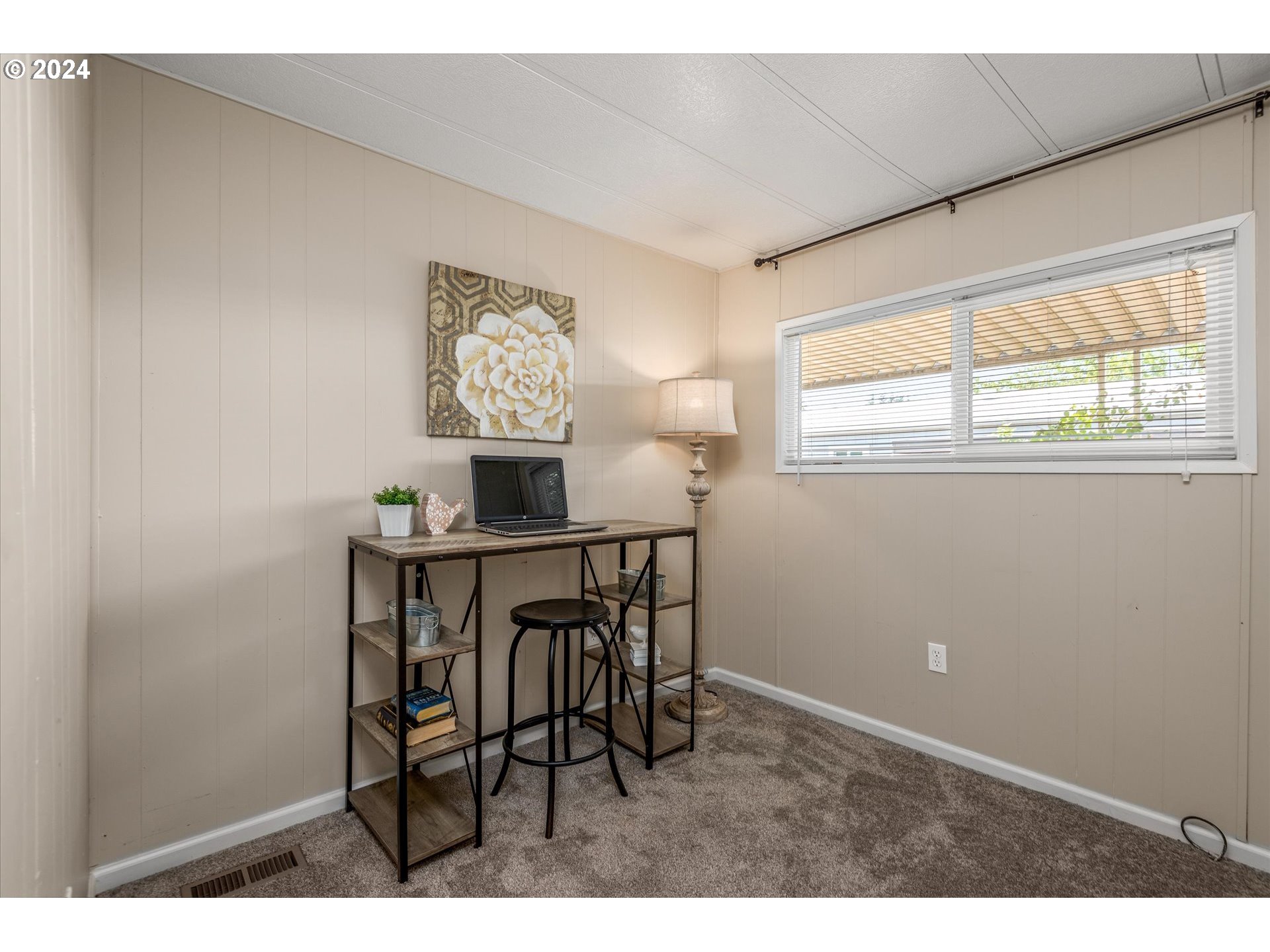 2150 Laura Street, Unit 90 Springfield, OR 97477 - Photo 13 of 18 a view of a dining room with furniture and window