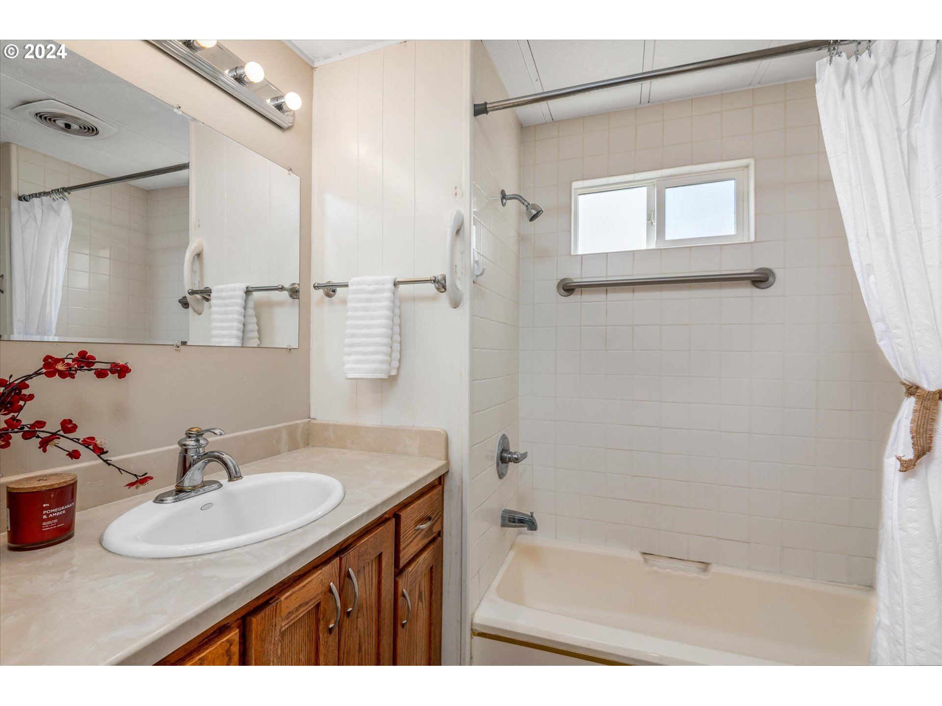 2150 Laura Street, Unit 90 Springfield, OR 97477 - Photo 14 of 18 a bathroom with a sink double vanity granite tub shower and a mirror