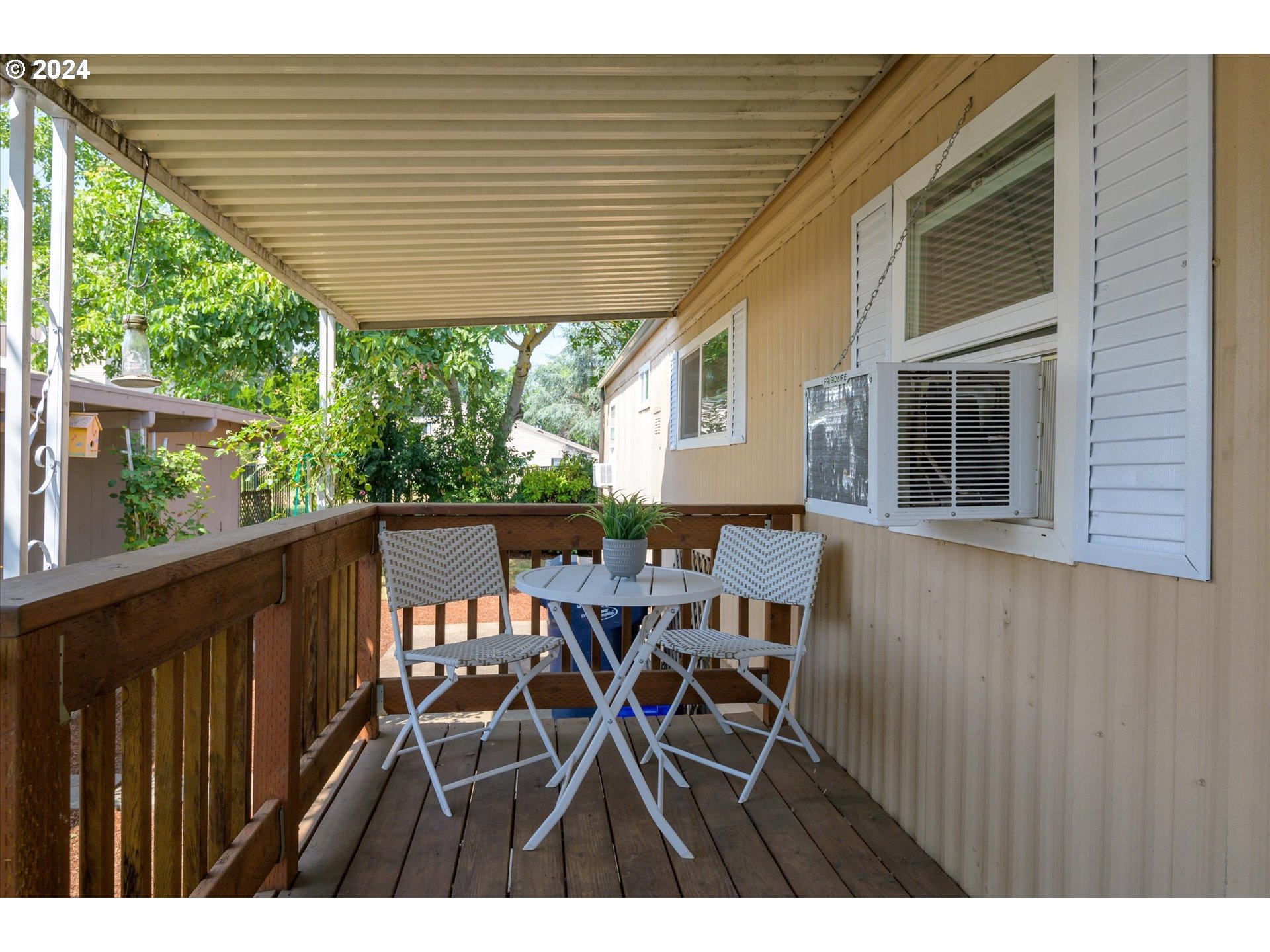 2150 Laura Street, Unit 90 Springfield, OR 97477 - Photo 3 of 18 a view of a chairs and table in the balcony