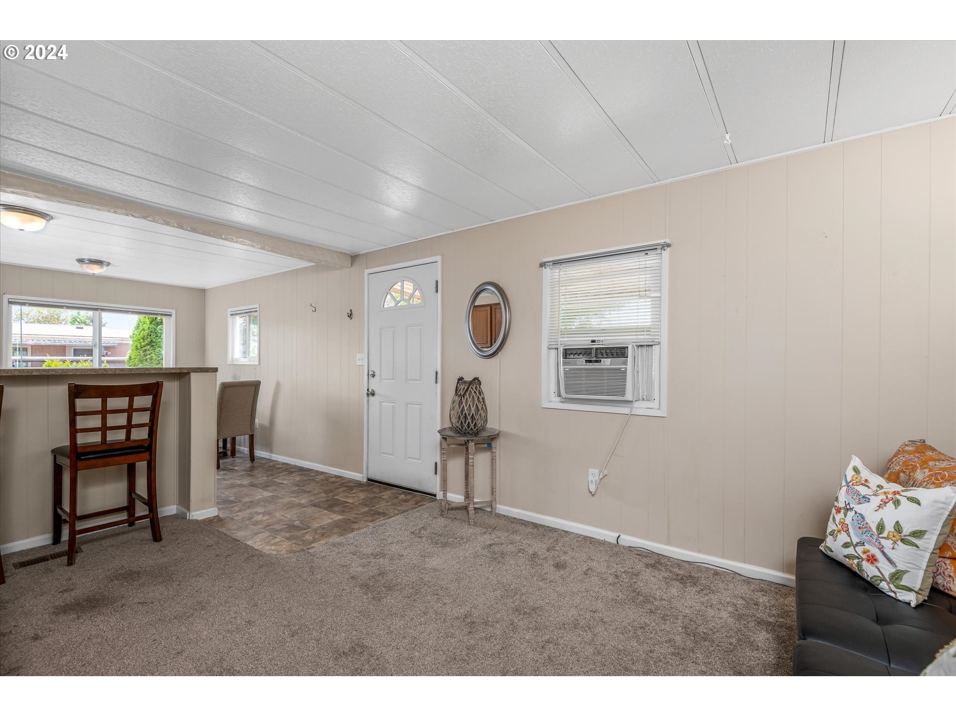 2150 Laura Street, Unit 90 Springfield, OR 97477 - Photo 10 of 18 a living room with furniture and a window