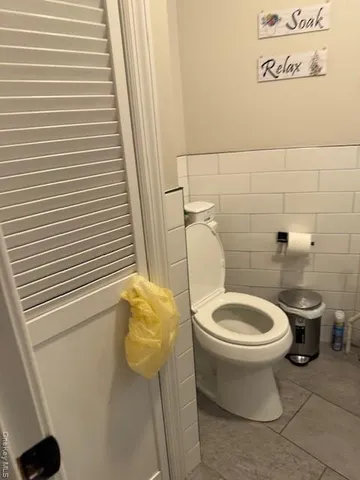 a bathroom with a toilet and a sink