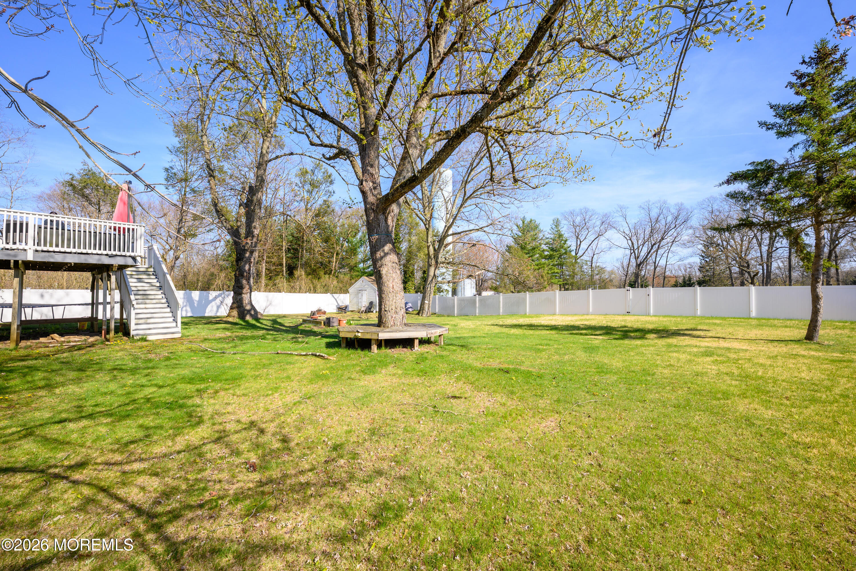 8 Holiday Road Manalapan, NJ 07726 - Photo 27 of 33 8_Holiday_Rd. Backyard w tree seat