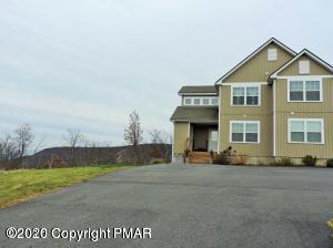 557 Upper Deer Valley Road Tannersville, PA 18372 - Photo 2 of 41 a front view of a house with a yard