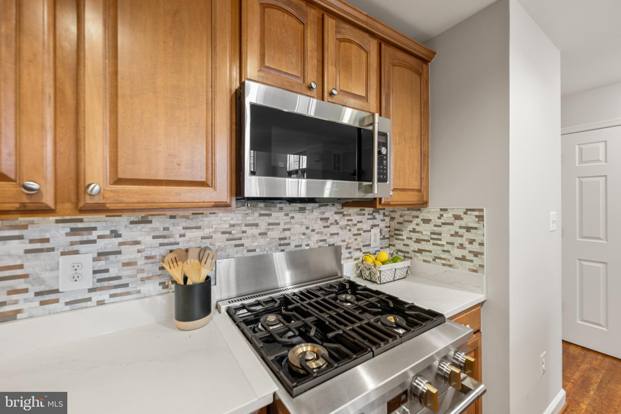 12444 Liberty Bridge Road, Unit 301A Fairfax, VA 22033 - Photo 12 of 34 Updated Kitchen with Stainless Steel Appliances