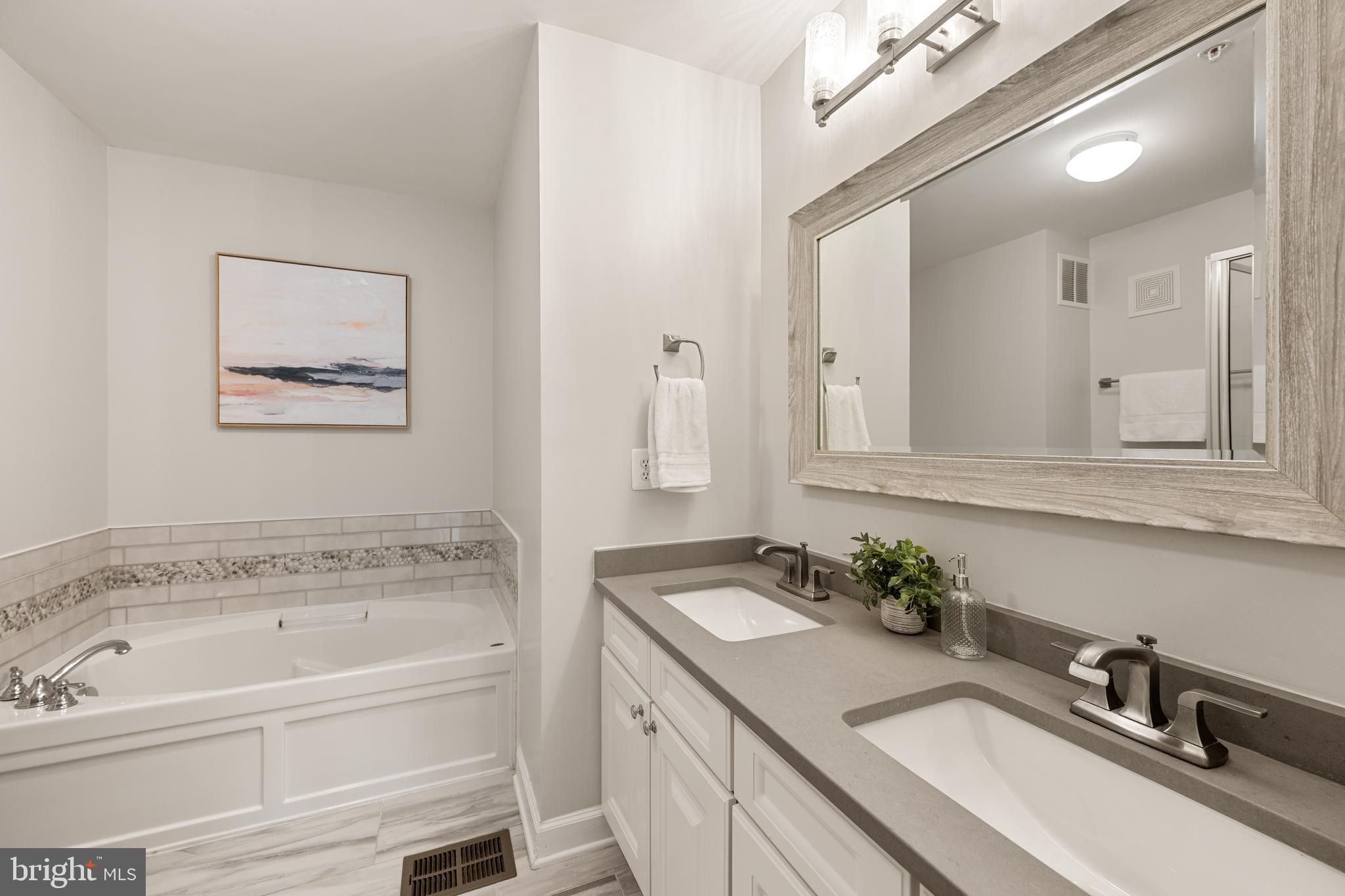 12444 Liberty Bridge Road, Unit 301A Fairfax, VA 22033 - Photo 21 of 34 Primary Bathroom En Suite