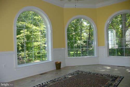 6608 Edsall Road Springfield, VA 22151 - Photo 16 of 29 a front view of a house with garden