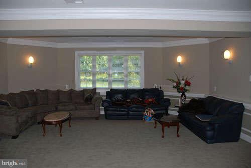 6608 Edsall Road Springfield, VA 22151 - Photo 26 of 29 a living room with furniture and a large window