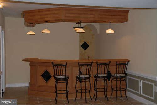 6608 Edsall Road Springfield, VA 22151 - Photo 27 of 29 a view of a chairs and table in a kitchen