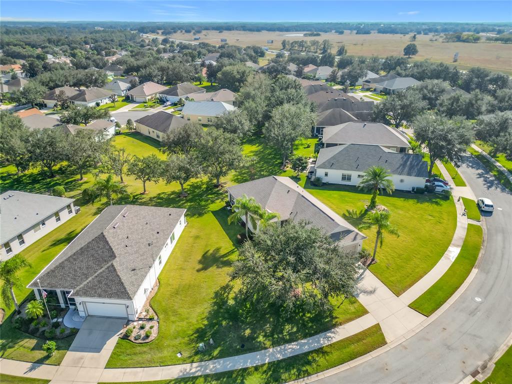 3529 Mt Hope Loop Leesburg, FL 34748 - Photo 46 of 86 an aerial view of residential houses with outdoor space