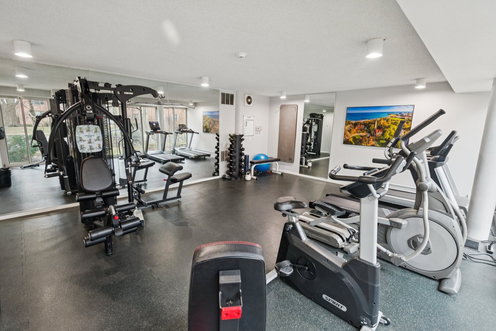 2555 Gross Point Road, Unit 101 Evanston, IL 60201 - Photo 19 of 23 a view of a room with gym equipment