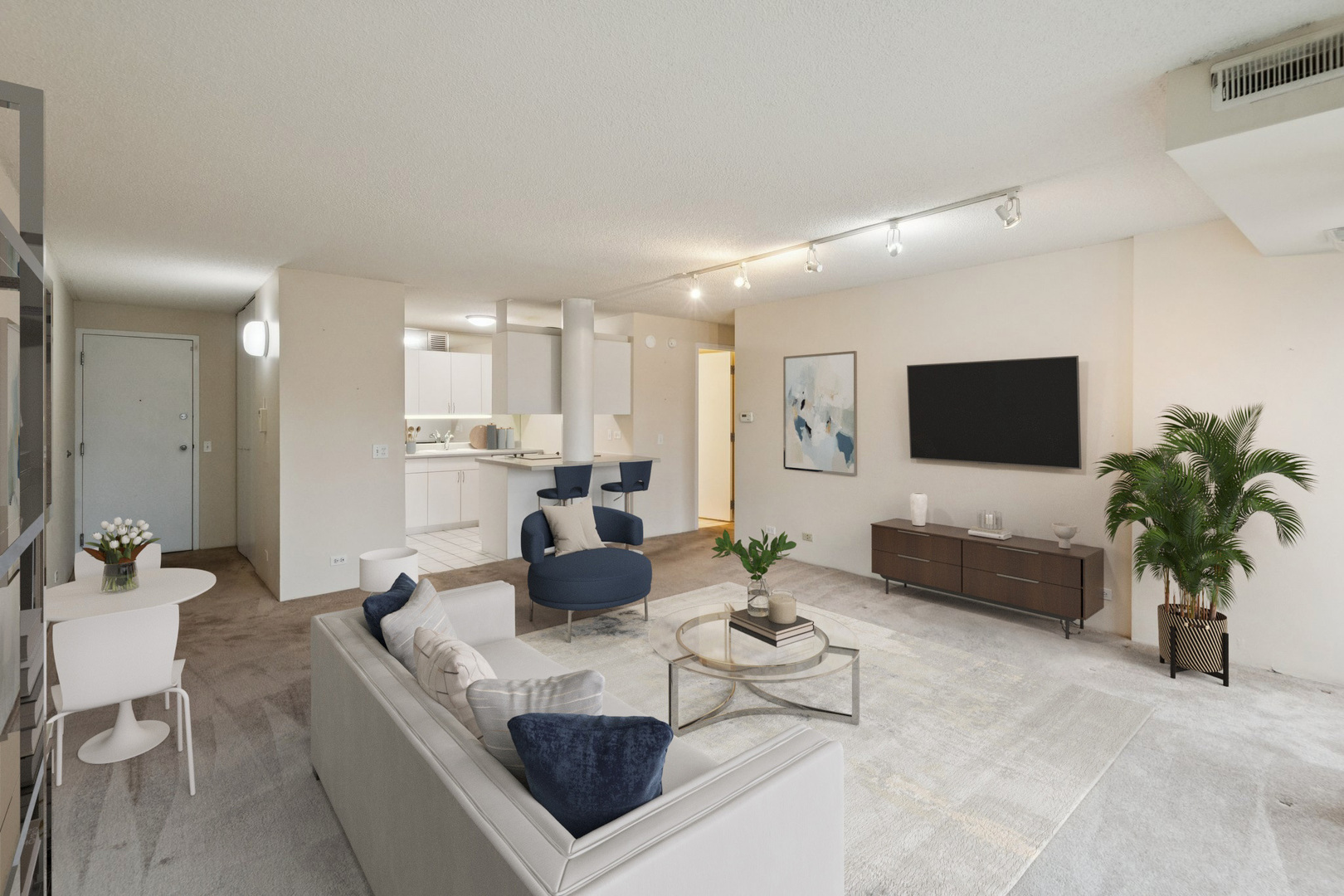2555 Gross Point Road, Unit 101 Evanston, IL 60201 - Photo 5 of 23 a living room with furniture and a flat screen tv