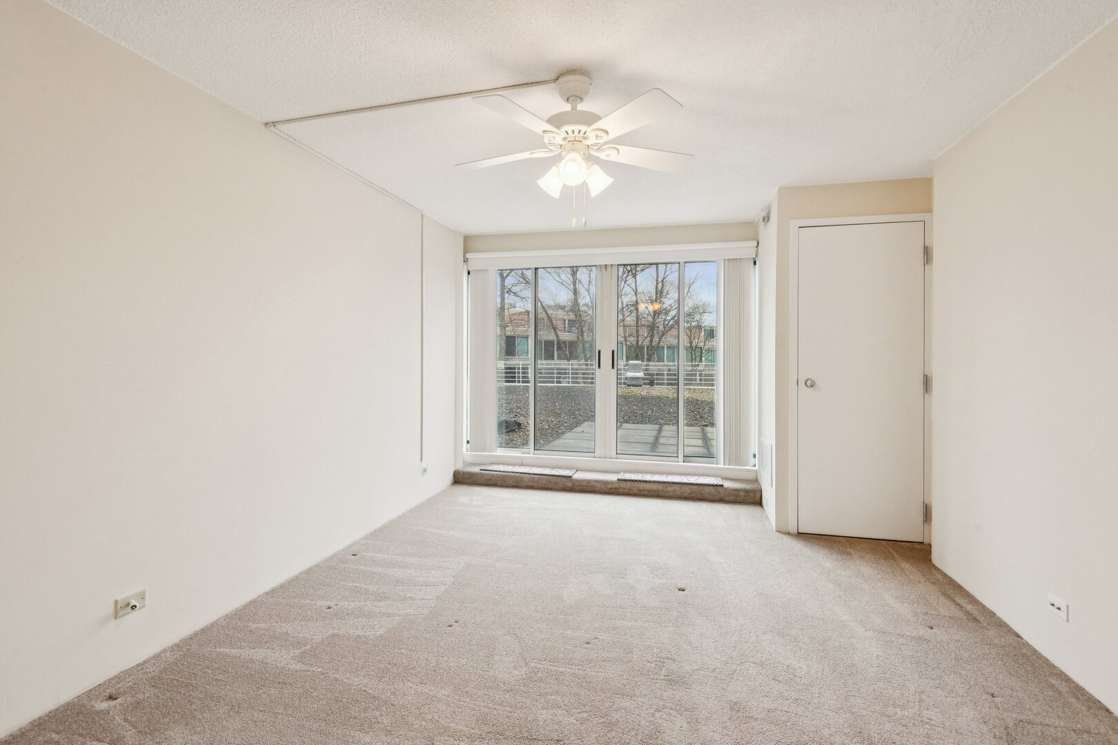 2555 Gross Point Road, Unit 101 Evanston, IL 60201 - Photo 10 of 23 a view of an empty room with a window