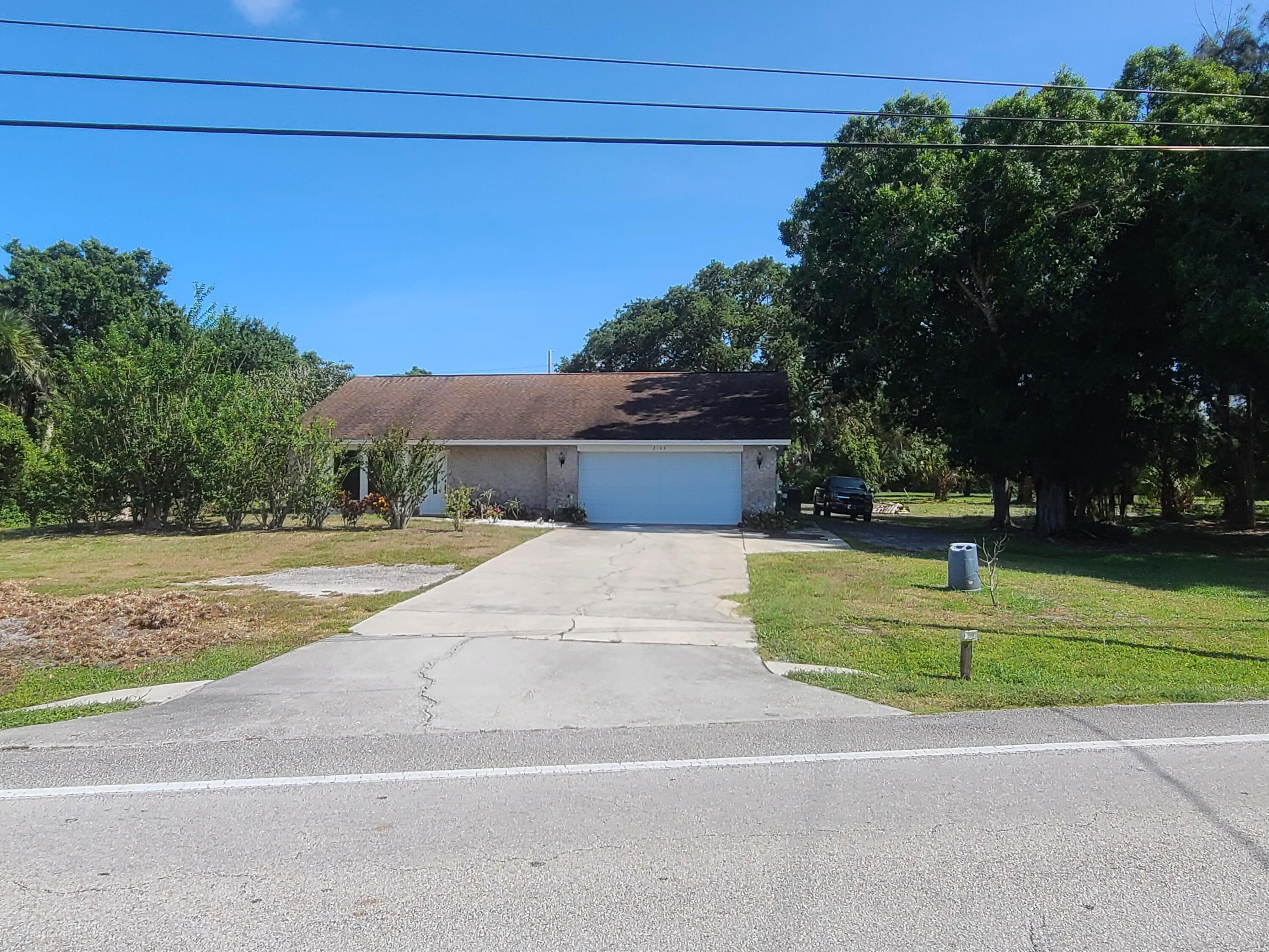 2165 Malabar Road Malabar, FL 32950 - Photo 2 of 2 a house view with a outdoor space
