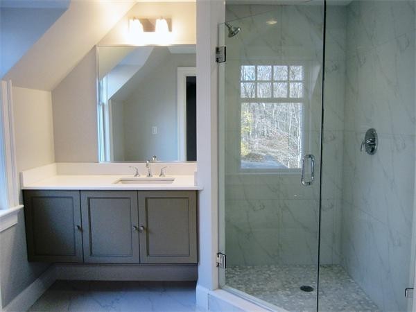 45 Old Farm Road Wellesley, MA 02481 - Photo 13 of 20 a bathroom with a sink mirror and shower