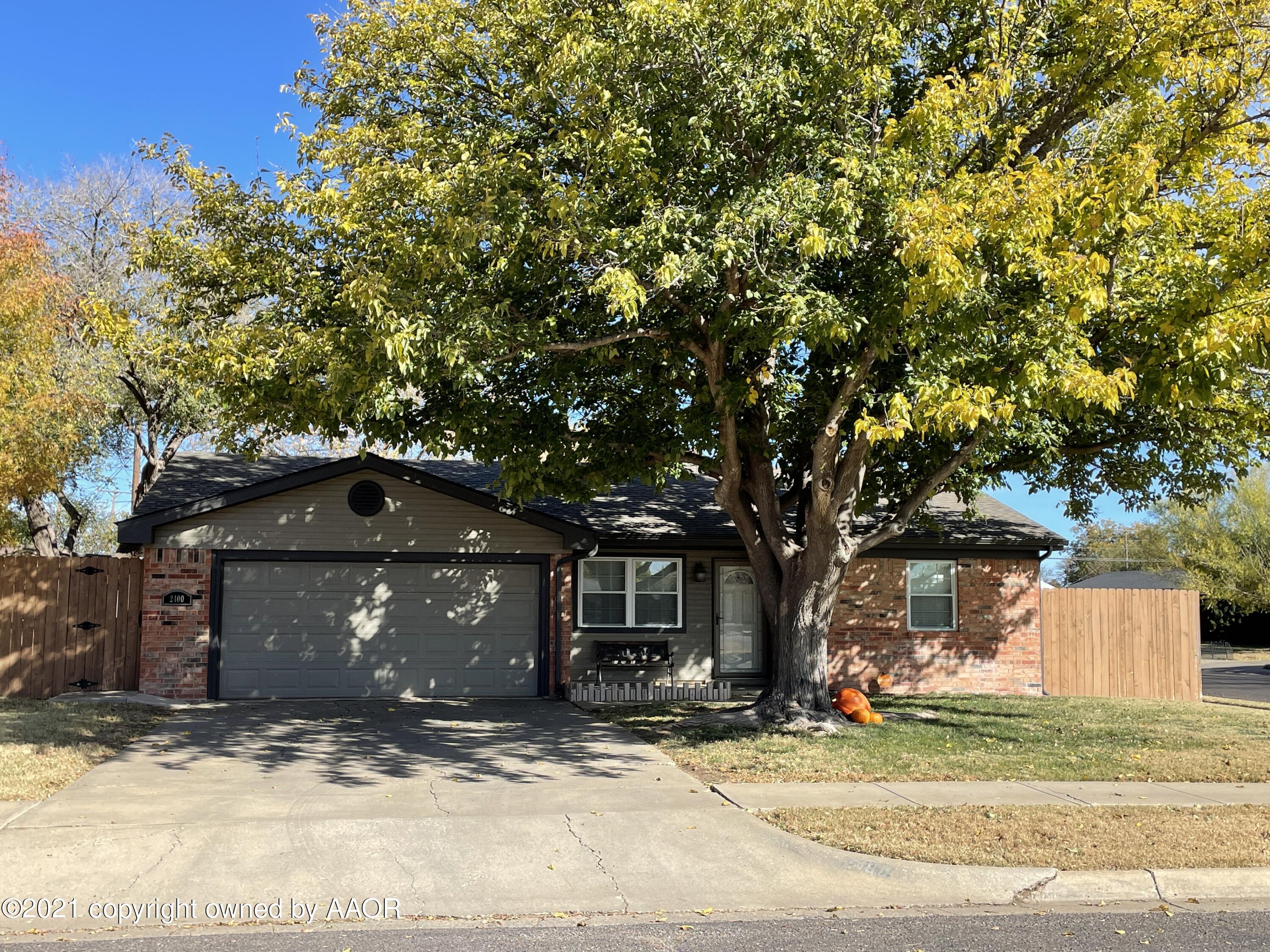 2400 Southwest 49th Avenue Amarillo, TX 79110 - Photo 1 of 1 a front view of a house with a yard