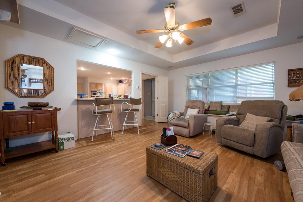 9554 David Fort Road Argyle, TX 76226 - Photo 8 of 35 a living room with furniture and a flat screen tv