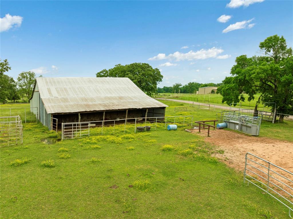 1355 County Road 33100 Sumner, TX 75486 - Photo 13 of 34 a view of a house with a big yard