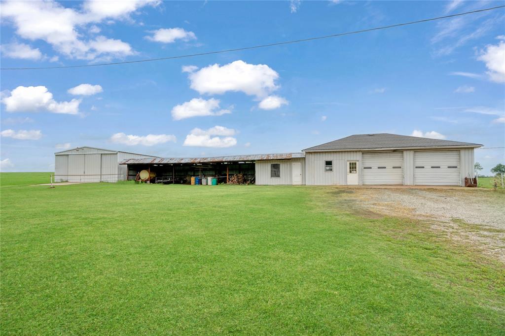 1355 County Road 33100 Sumner, TX 75486 - Photo 34 of 34 a large building with a big yard
