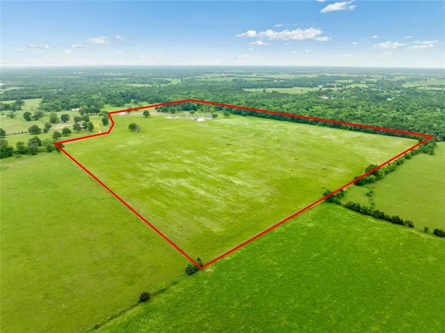 a view of an outdoor space and tennis court