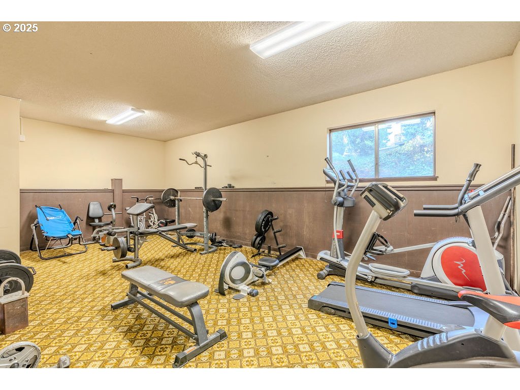 200 Southwest Florence Avenue, Unit D15 Gresham, OR 97080 - Photo 17 of 29 a view of a room with gym equipment