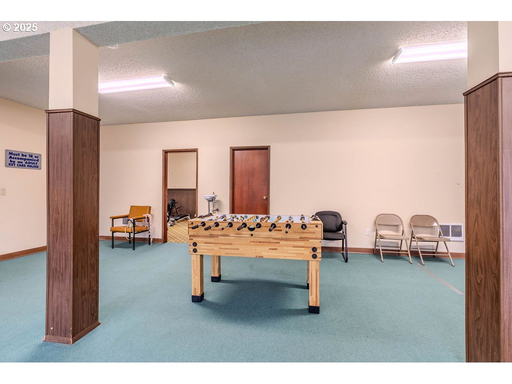 200 Southwest Florence Avenue, Unit D15 Gresham, OR 97080 - Photo 19 of 29 a living room with furniture and a table