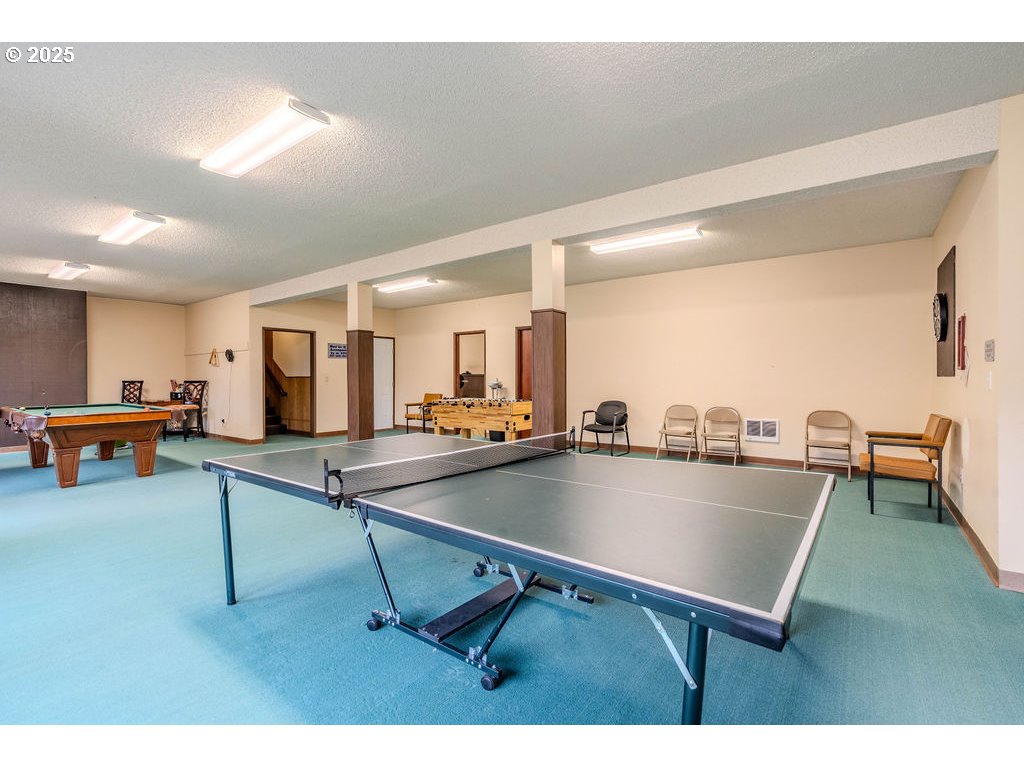 200 Southwest Florence Avenue, Unit D15 Gresham, OR 97080 - Photo 20 of 29 a living room with dining table tennis table and a table