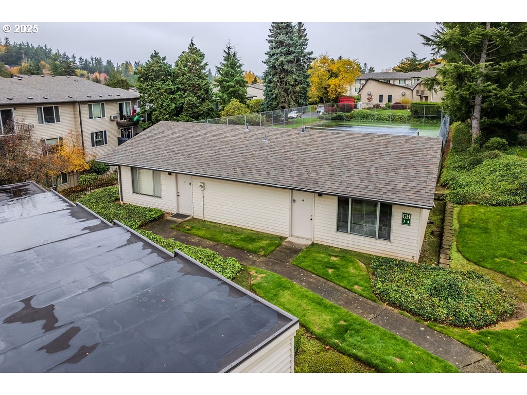 200 Southwest Florence Avenue, Unit D15 Gresham, OR 97080 - Photo 29 of 29 a aerial view of a house with a yard and potted plants