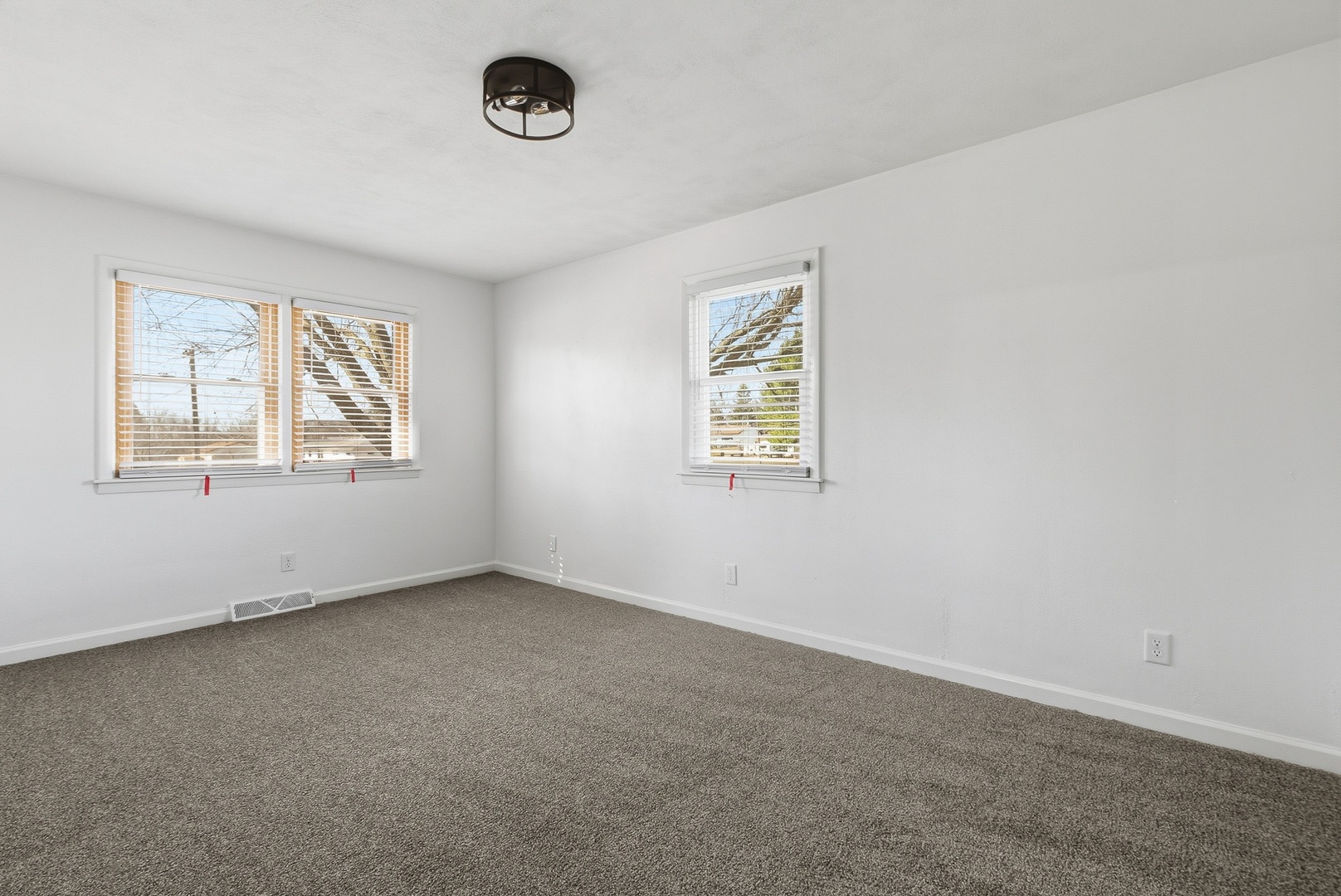 11622 27th Street West Milan, IL 61264 - Photo 24 of 49 an empty room with windows