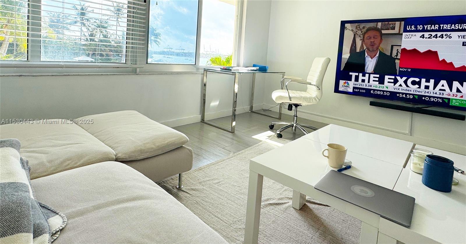 1200 West Avenue, Unit 202 Miami Beach, FL 33139 - Photo 2 of 45 a living room with furniture