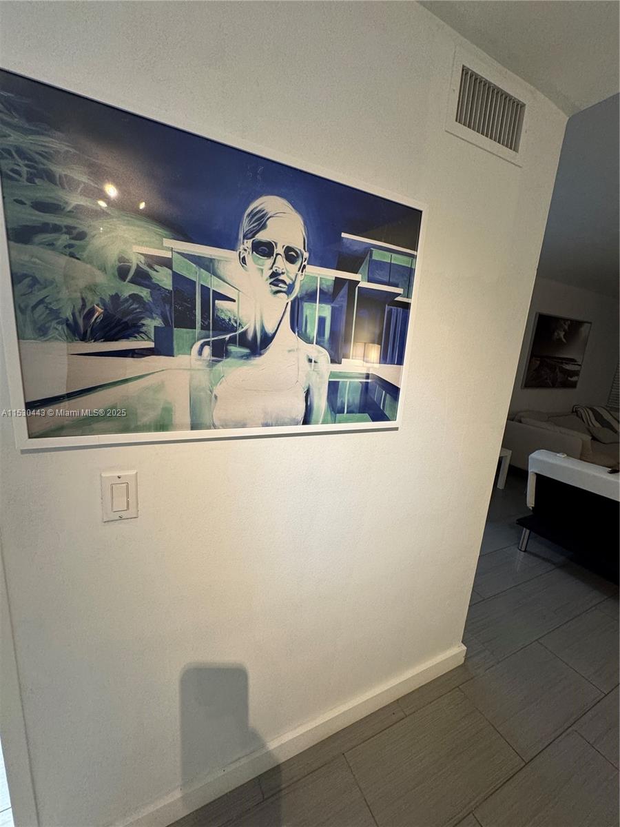 1200 West Avenue, Unit 202 Miami Beach, FL 33139 - Photo 21 of 45 a view of washer and dryer