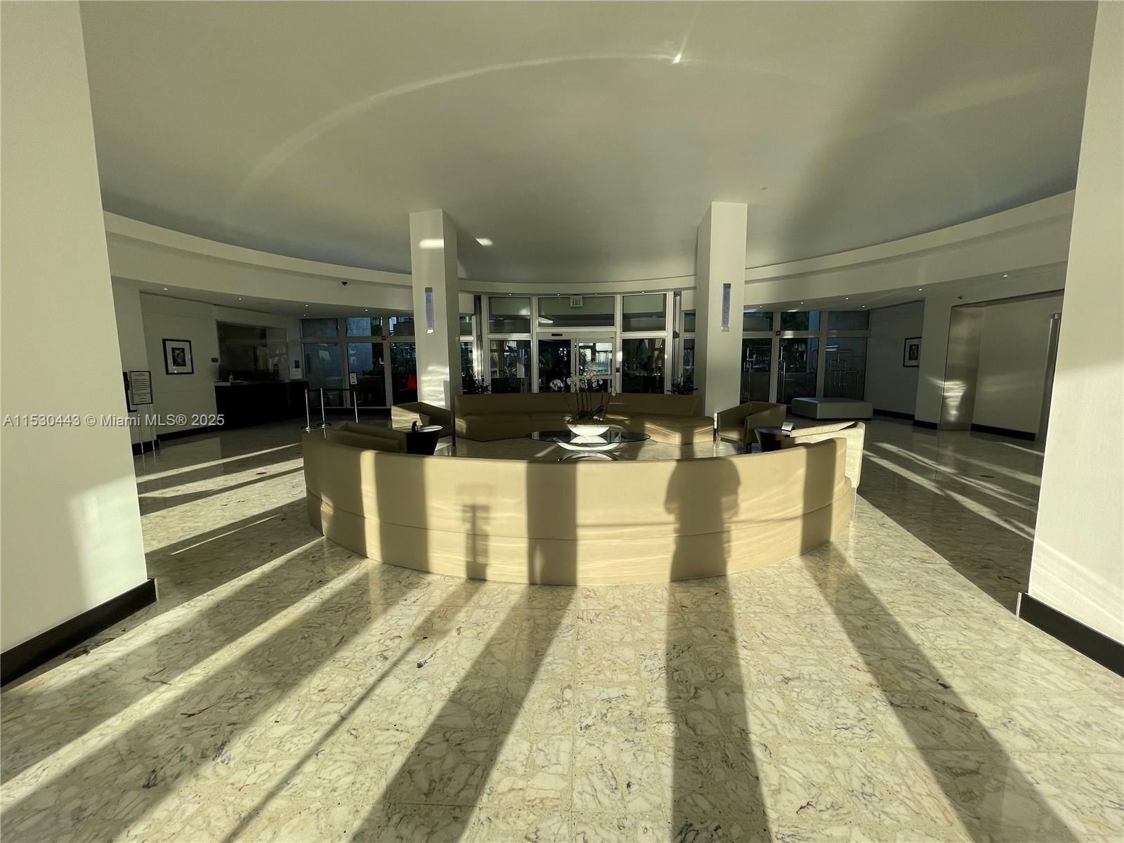 1200 West Avenue, Unit 202 Miami Beach, FL 33139 - Photo 31 of 45 a view of a lobby with black carpet