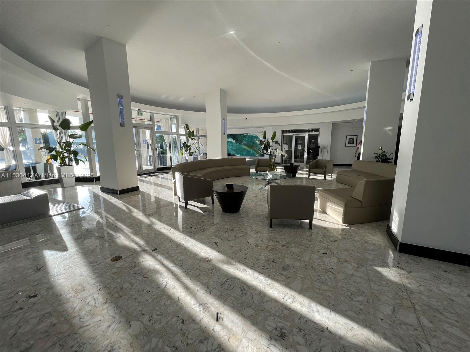 1200 West Avenue, Unit 202 Miami Beach, FL 33139 - Photo 33 of 45 a view of a living room and a couch