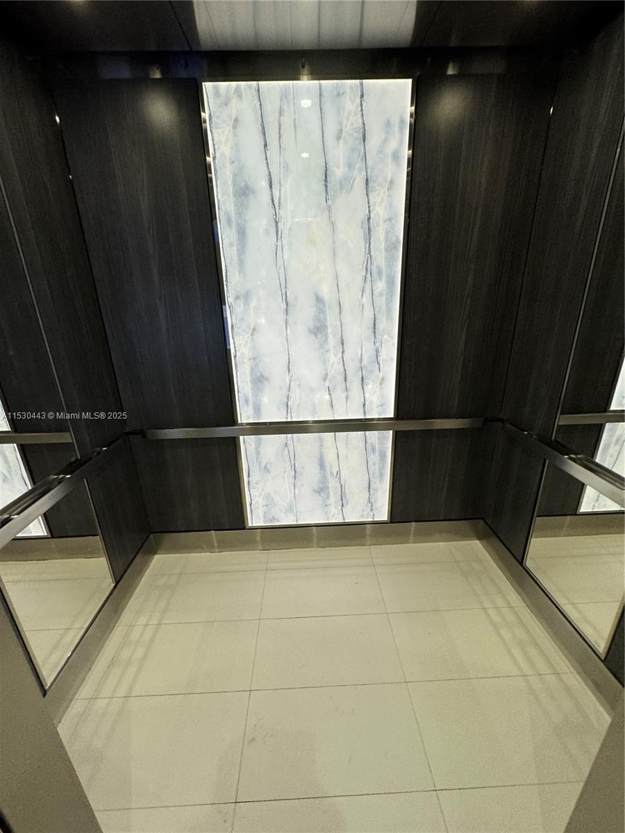 1200 West Avenue, Unit 202 Miami Beach, FL 33139 - Photo 36 of 45 a view of a walk in closet