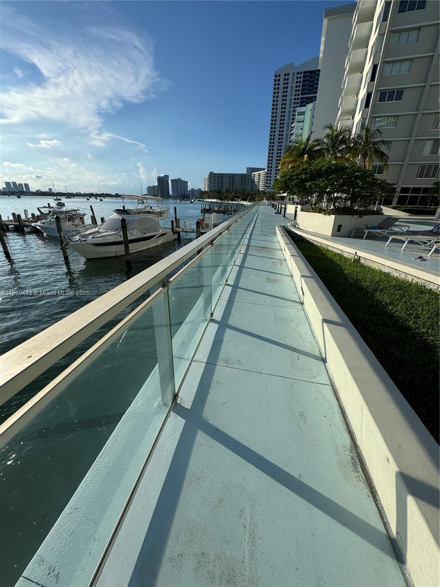 1200 West Avenue, Unit 202 Miami Beach, FL 33139 - Photo 38 of 45 a view of swimming pool with outdoor seating