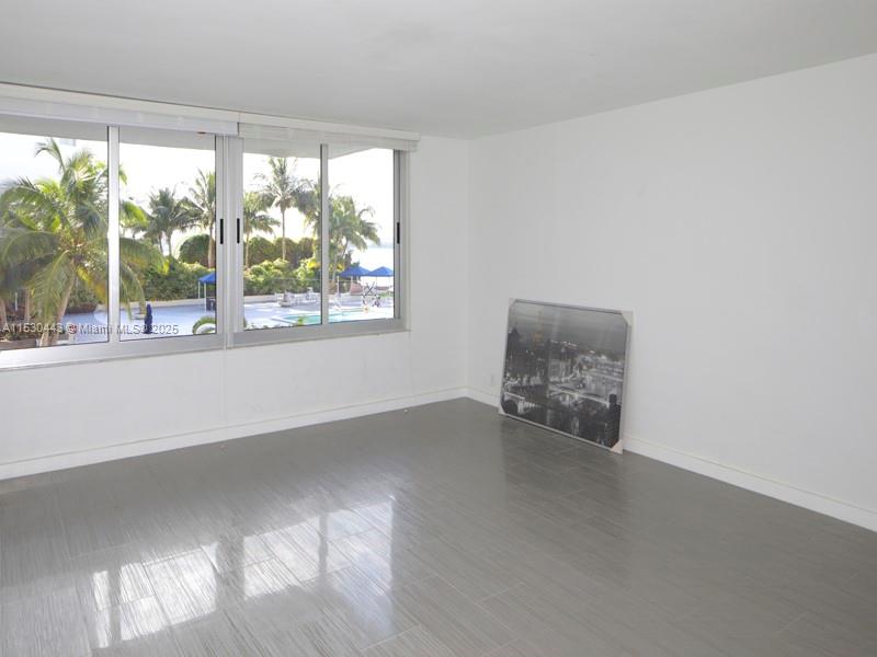1200 West Avenue, Unit 202 Miami Beach, FL 33139 - Photo 45 of 45 an empty room with a window