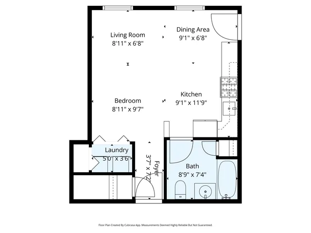 a black and white photo of a bench